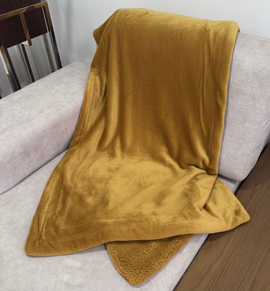 Manta decorativa con suave piel de cordero