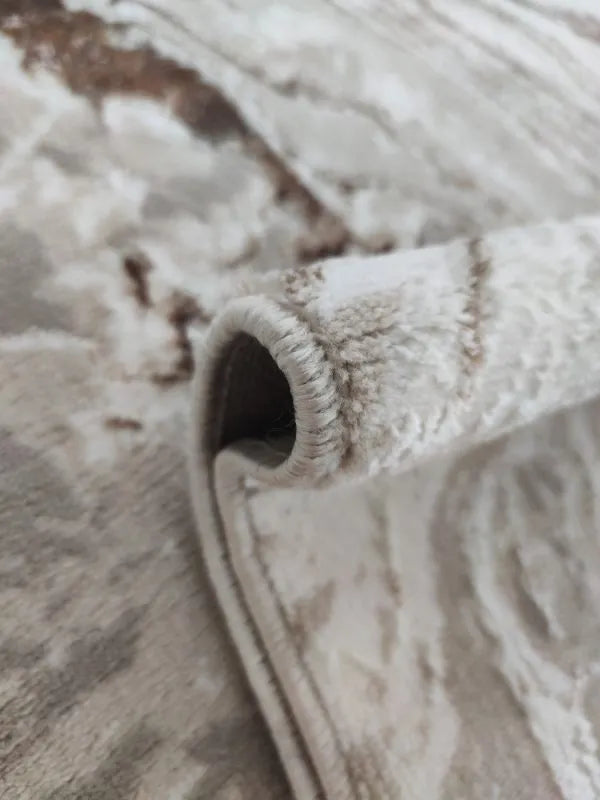 Alfombra beige de Zara