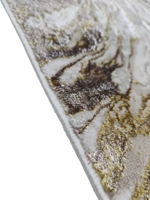 Alfombra dorada de Zara