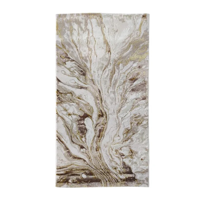 Alfombra dorada de Zara